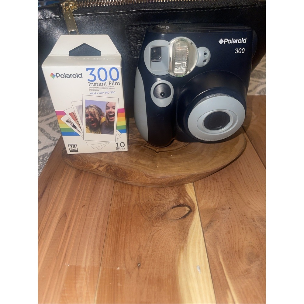 polaroid 300 instant camera Black Untested With New Instant Film 10 Prints